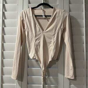 Free People Cream Long Sleeve Bodysuit